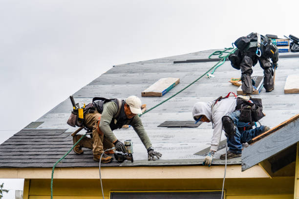 Professional Gutter Installation technician working in Blue Point, NY